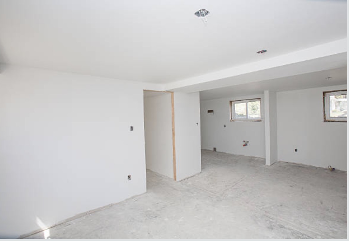 Freshly finished basement drywall in Portland home